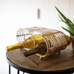 Wrapped Brass Metal & Rattan Wine Bottle Holder - Foreside Home & Garden -Restaurant Furniture Store GUEST 4b947676 9494 4b03 9768 b05e2fd6983f